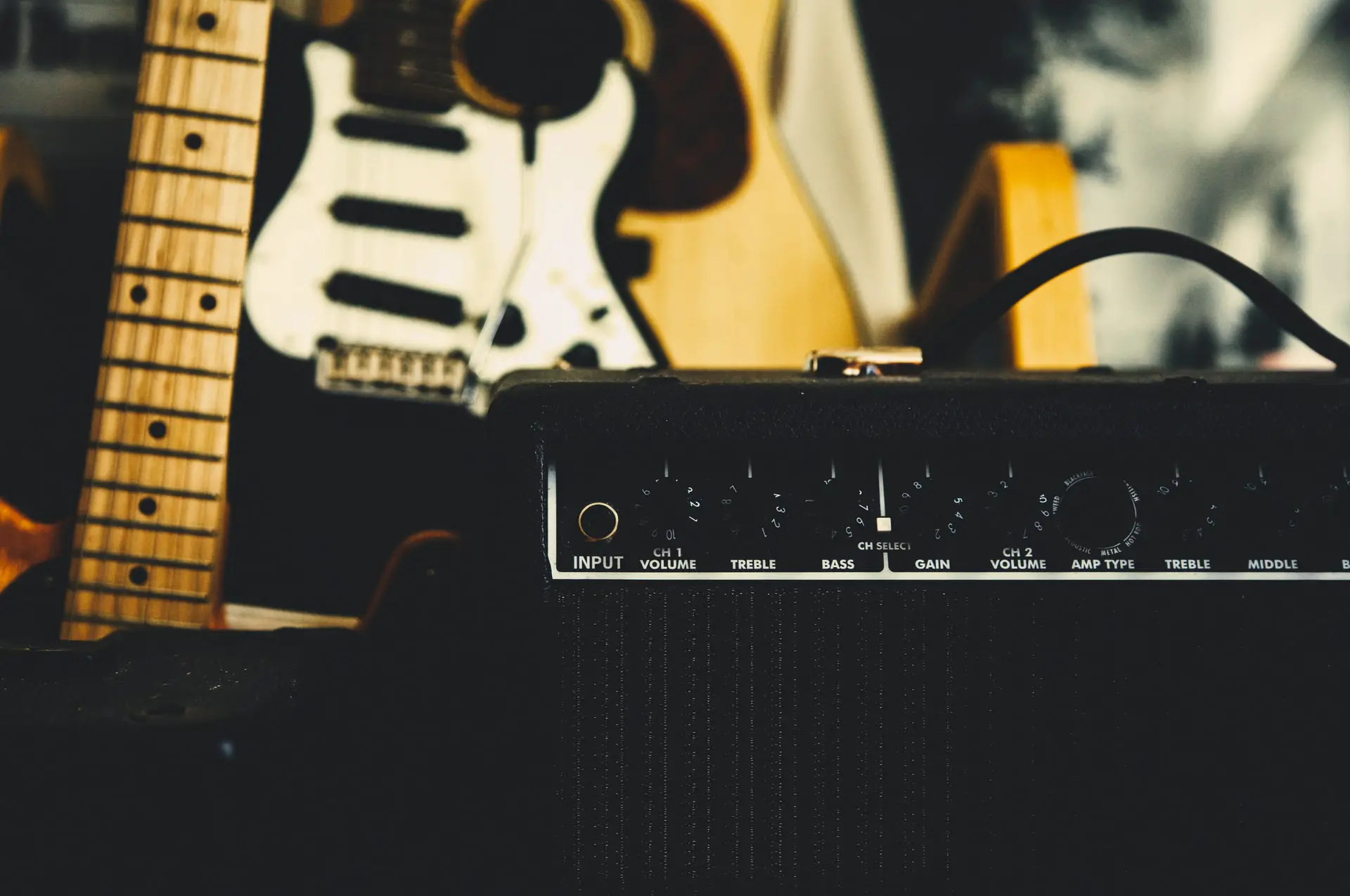 Guitar Amp Buzzing & Popping: 6 Common Reasons & Fixes