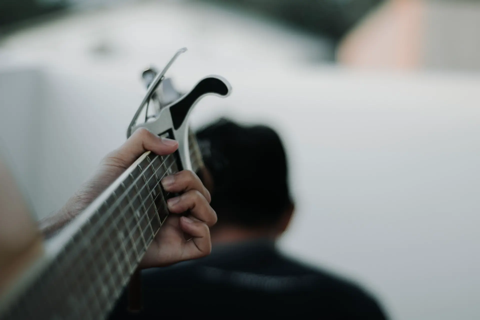 Metal Vs Plastic Vs Wood Capo: Which To Pick & Does It Matter?