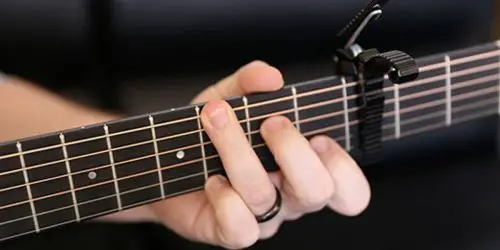 A capo that's too tight can damage the guitar if left on for a long time