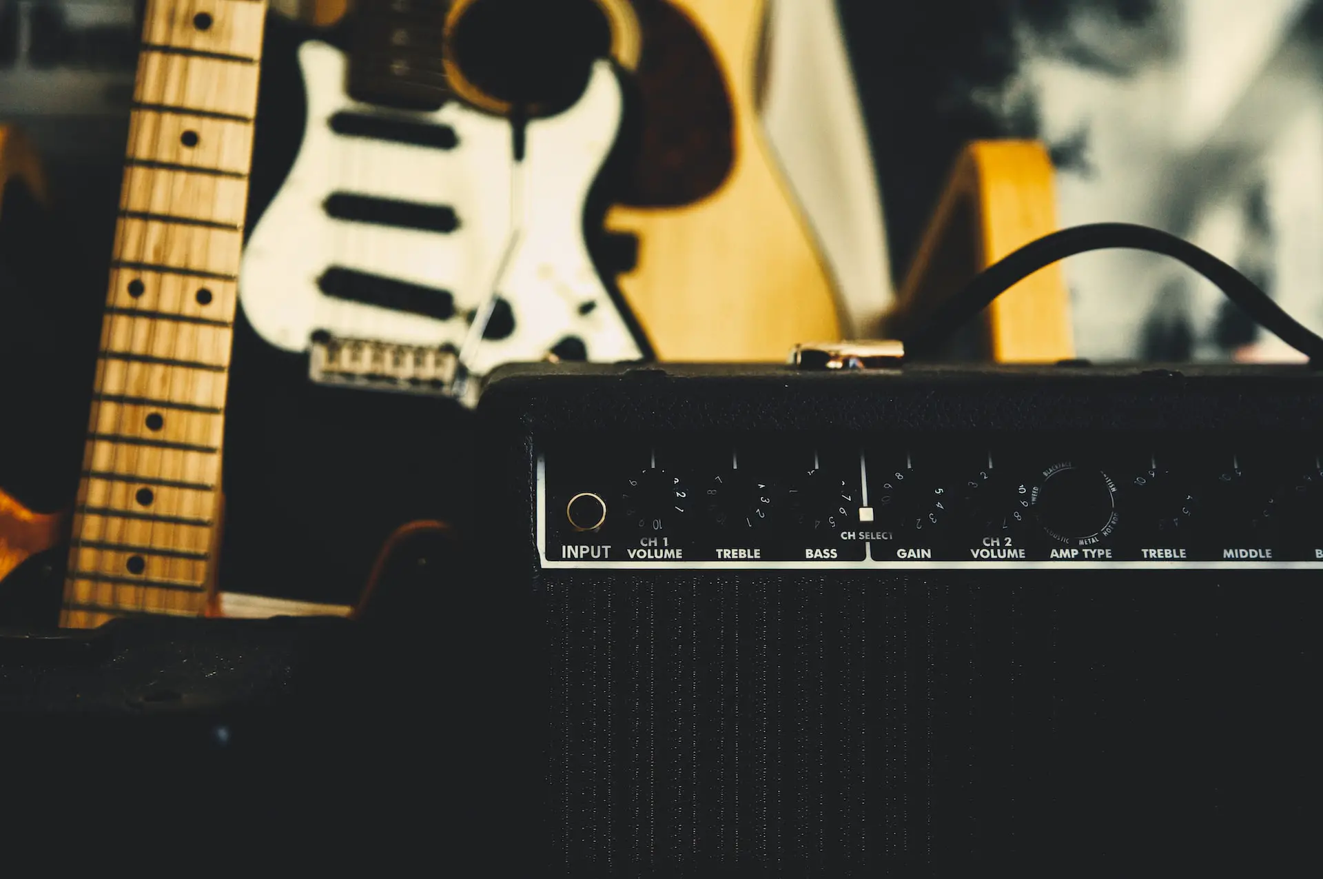 Playing Guitar With Bass Amp: Tone Difference, Safety & FAQs